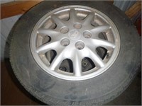 4 Aluminum Rims and Tires 205/60 R15 35 % Tread.