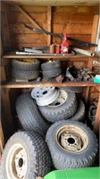 Lawn Mower Tires and contents on shelves