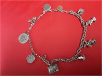 WELLS STERLING LIFE STORY CHARMS ON BRACELET