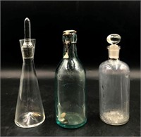 Glass Decanter Pharmacy Bottle and a Drink Bottle