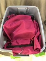 6 purple table cloths in a tote