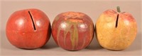 Three Cold-Painted Earthenware Apple Still Banks.