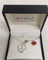 STERLING PEACE CHARM AND NECKLACE