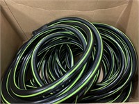Green and black garden hose