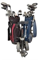 Golfing lot to include two bags, wheeled bag cart