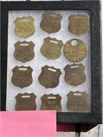 Railroad Tags in Display Case.