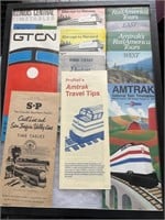 Railroad Timetables/Brochures in Display Case.