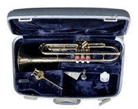 Conn brass trumpet in hard sided case. Trumpet