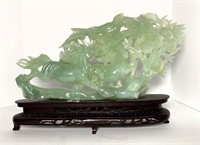 Carved Jade Like Sculpture on Rosewood