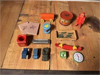 Wood harmonica, vintage coin bank and toys