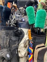 golf clubs with bags and bag trolley