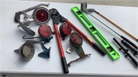 Kids golf clubs, cutters, old Chevrolet car