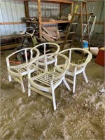 four metal plastic lawn chairs