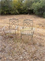 Pair of vintage, heavy iron patio chairs