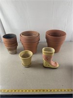Flower pots. Some ceramic, some plastic.