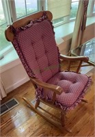 Solid wood arm chair rocker with padded cushion,