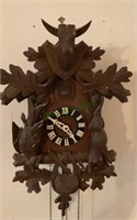 Vintage Schwartz coo-coo clock with hunter motif