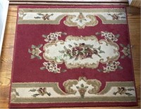 Two small and one large rug. Small rugs measure