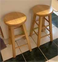 One pair of 24 inch solid wood barstools