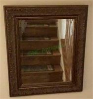 Beautiful beveled glass mirror with carved frame