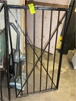 STEEL GATE OR WINDOW COVERS APPROX 30 IN X 54 IN