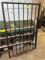STEEL GATE OR WINDOW COVERS APPROX 40 IN X 62  IN