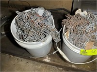 THREE BUCKETS OF TIRE CHAINS