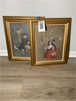 PAIR OF FRAMED ORIENTAL THEMED PRINTS 17IN BY 21IN