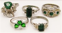 (5) SILVER TONE RINGS WITH GREEN GEMS