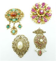 (4) GOLDTONE AND STONE BROOCHES