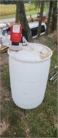 55 gal plastic barrel with hand pump.