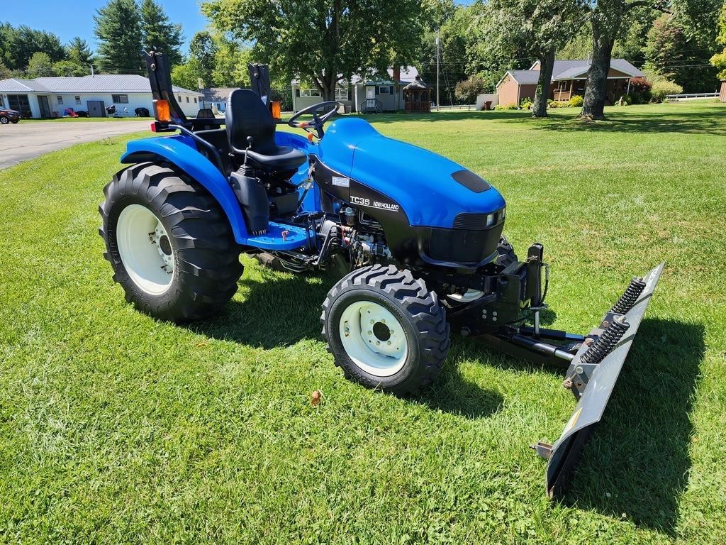 2002 TC 35 New Holland 4WD Tractor and NH7020 Plow