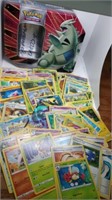 70 plus Pokemon cards 2012-22 with tin