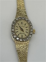 10KT Gold Geneve Ladies Diamond Watch.