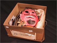 Box of vintage Halloween masks and Halloween