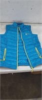 NEW Mediun Puffer Vest w/ carrying case, 
Blue &