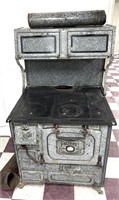 Antique home comfort wood stove