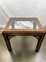 Glass and wood end table. Approximately 26 x 22 x