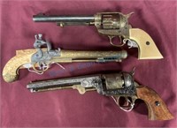 Group of three stage prop pistols