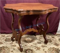 walnut turtle top parlor table