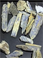 Assorted blue tourmaline stone specimens.