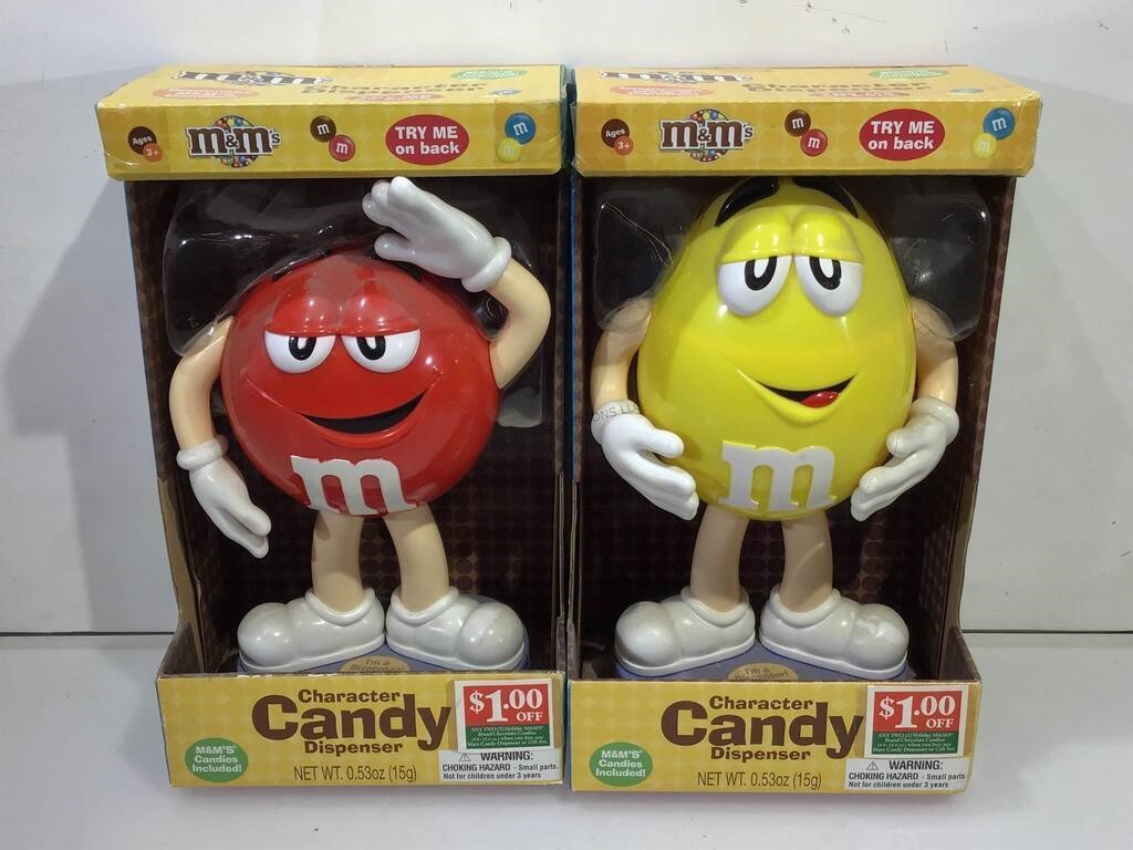 2 NIB MnM candy dispensers. Yellow, Red.