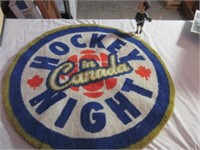 Hockey Night in Canada rug and bobble head