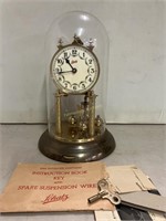 Schatz anniversary clock with key and paperwork