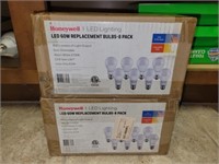 2 unopened boxes of 8 LED 60w Honeywell bulbs