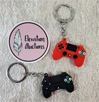 Pair of Black and Red Game Controller Keychains