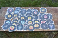 Approximately 65 45-RPM records: Beetles, Stones,
