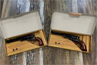 Set of 2 consecutively numbered guns new in boxes: