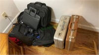 Collection of vintage briefcases, gun