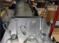 THREE GLASS SERVING PITCHERS